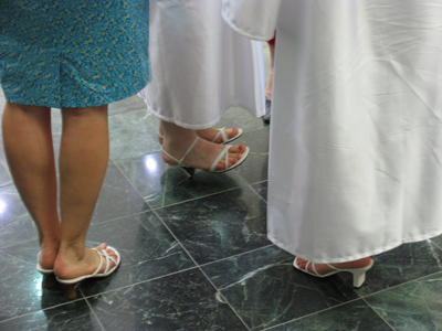 Pomp, circumstance and white sandals.