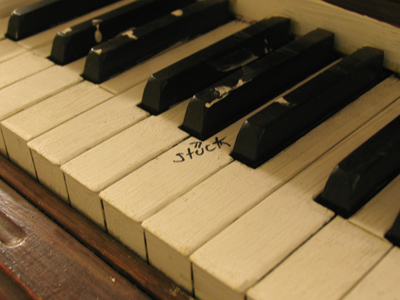 Possibly `stuck` due to the paint applied to the keys.