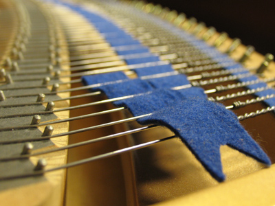 Blue felt:  it must be a Kawai.