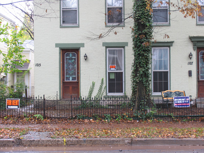 My neighborhood was equally divided between those who were for Bush and those who were for rent.