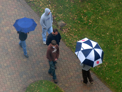 University Admissions tour guides must be capable of walking backward while holding an umbrella.
