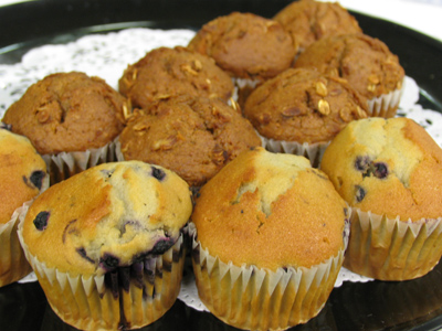 The refreshment table had many mini muffins.