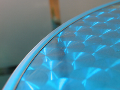 Shiny table under funky light.