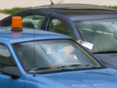 The short and somewhat chubby arm of the law.