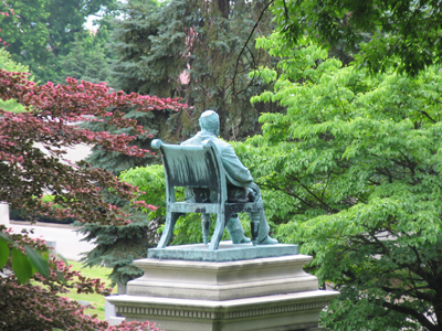 Out sitting in his field.