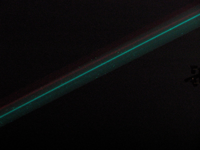 A bright laser pierces the dark night, and confuses a lot of poor bugs.