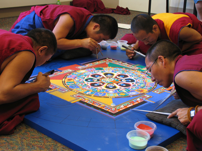 Today the Buddhist monks continued work on the mandala.
