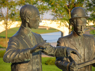 `Don`t be shy, Orville.  When the music starts, you just kind of lead her around the dance floor like this.`