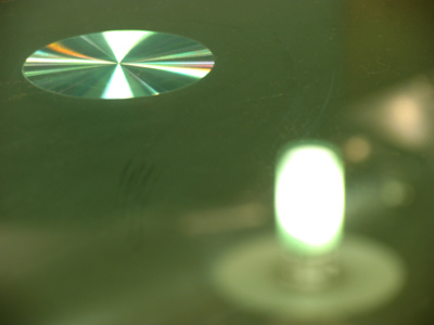 One is a reflection, the other is not.