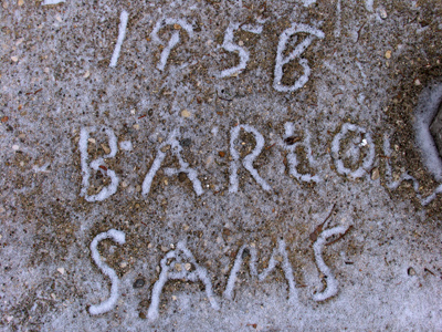 On my sidewalk:  a message from long ago.