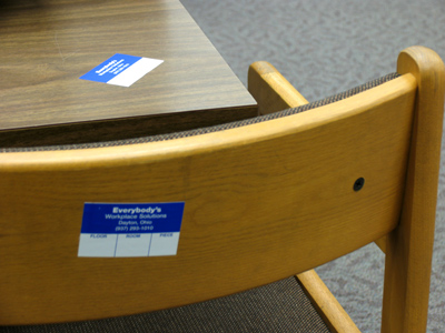 These stickers indicate this stuff is useless and is going to be discarded.  Hey -- wait!  What`s this on my back?