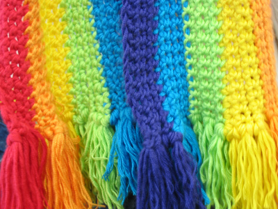 A rainbow, knitted by hand.