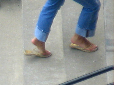 That`s why they call `em flip-flops.  I could never wear them.  My footwear is laced on tight, thanks.