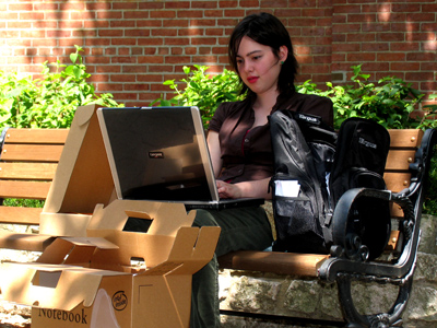 Brand spankin` new freshman with her brand spankin` new computer, just out of the box.