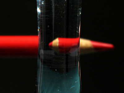 Seen through a glass darkly.