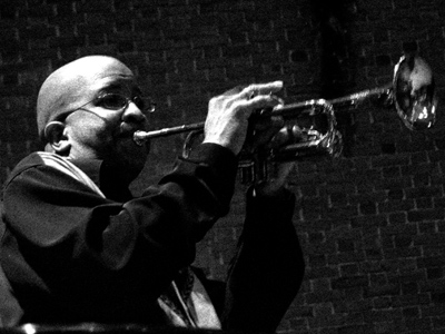 He pours into the curved and silver horn his old unhappy longing for a home.  EDWARD BRATHWAITE