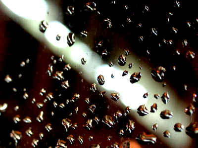 Vaguely similar to August 3, 2004, but these drops are on my side-view mirror.