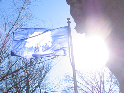 An `Oak and Ivy` flag flies above Paul Laurence Dunbar`s grave.
