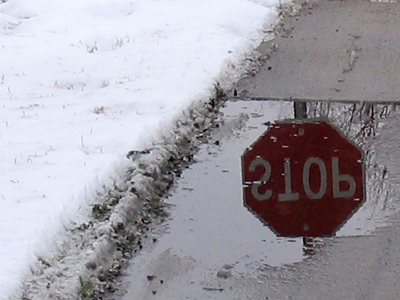 The same truck as seen January 15, now with TWO flat tires (and yet somehow it moved 100 yards).