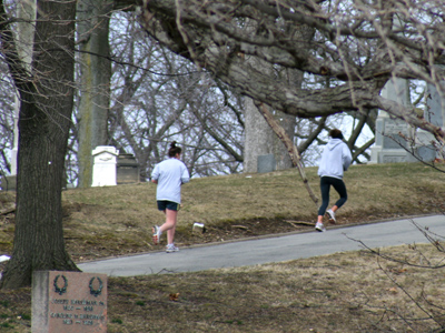 Living people in the cemetery?  I later saw the runner on the left with ice packs around her calves.