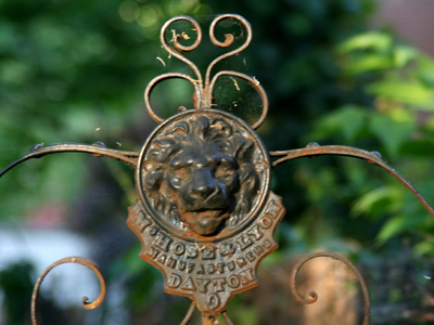 The gate reads McHose & Lyon Manufacturers.  William McHose built his own house not far from this spot in 1873.