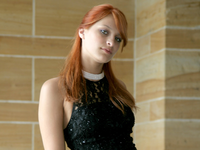 Her new hair color reminds me of my caption about the house finch on June 15, 2007.