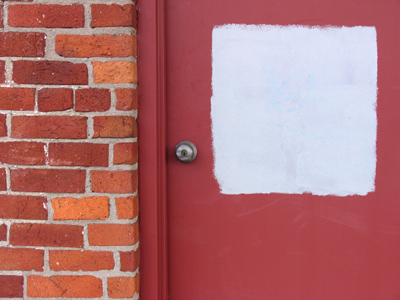 Someone painted graffiti on the doors.  Someone else decided this is an appropriate solution.