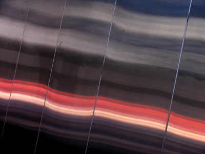 Shiny building . . . orange netting across the street.