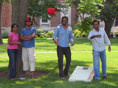 Instead of crowding into a telephone booth, college students today play cornhole.