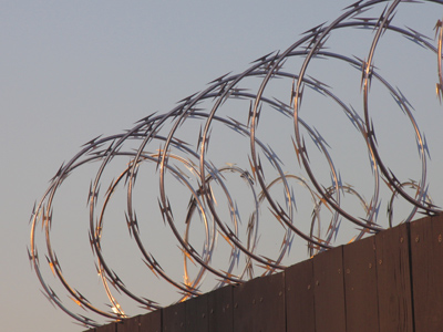 Before I built a wall I`d ask to know what I was walling in or walling out, and to whom I was like to give offence. Something there is that doesn`t love a wall. ROBERT FROST