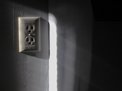 Homage to Kathryn Koran.  Light reflects in a downward diagonal and upward in a counterclockwise swirl.