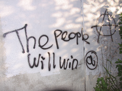The people will lose, because they have no power.  They have exchanged power - willingly and eagerly - for material possessions and entertaining diversions.