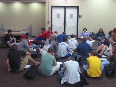 A religion class makes a pilgrimage to the library.