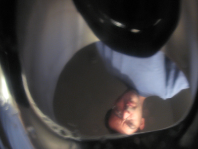 Self-portrait in an ice cream scoop.