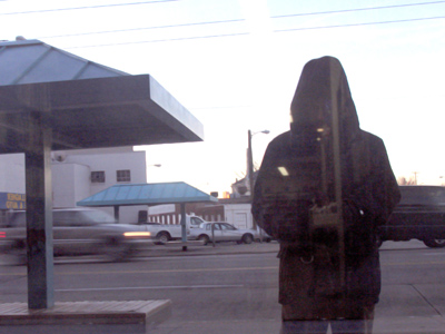 Black coat, black hood, black camera.  Could I be any more sinister?