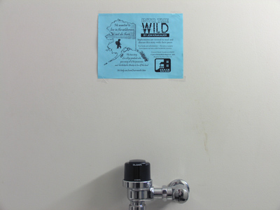 It gives me a special kind of pride to see a sign I designed hung in the restroom.