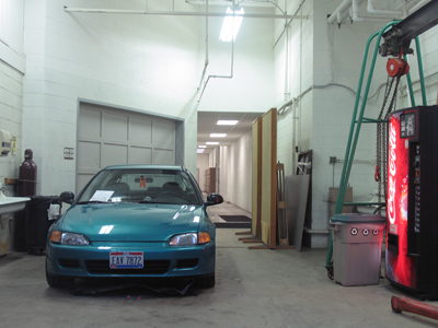 Last year there was a boat outside my photography classroom.  This year we`ve been downgraded to a car.