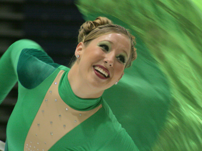 I don`t know this girl, but I was sent on a mission from her mother to get a good shot for her graduation scrapbook. [UPDATE:  This picture made it into the program book of the color guard world championships in April]