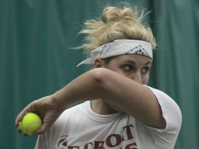Getting the sign from the catcher.