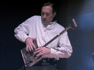 Ken Butler plays music on a shovel.