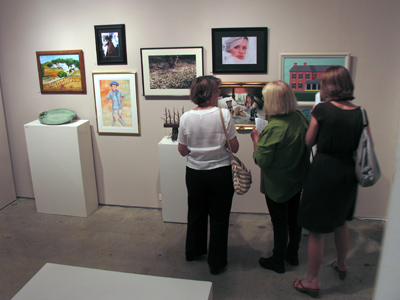 Once the exhibition opens, people flock to my photograph (see April 6, 2008), if three people can be called a flock.