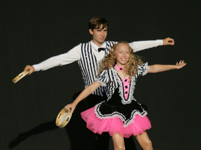 Poor guy is still dancing with his little sister (see August 3, 2005).