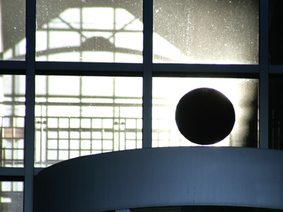 If I stand at just the right place outside the law building, I can create a total eclipse of the sun.