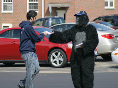 `Apes on strike . . .   Management unfair to apes . . .  Support the apes on strike . . . `