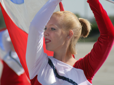 Color guard:  spinning flags outdoors.  Winter guard:  spinning flags indoors.  I`m usually a winter guard guy.