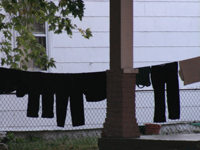 Hung out to dry.  Blowing in the wind.  Holding the line.  Insert cliche here.
