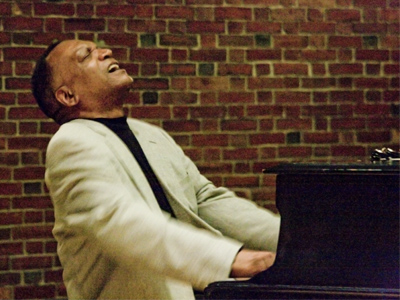 After five years of taking pictures, I`ve found many sure things: the Butterfly House, any horse-jumping show, a color guard competition, and Khalid Moss at the piano.