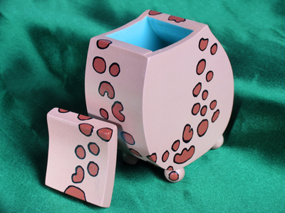 These whimsical wooden boxes are made by a talented coworker.