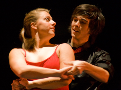 The only male in the ensemble gets to dance with all the girls.