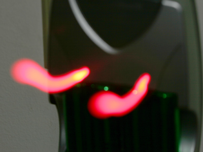 My new battery charger emits a strange glow.  I resist the urge to put my tongue on it.